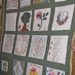 The family quilt, each square made by one of her children or grandchildren